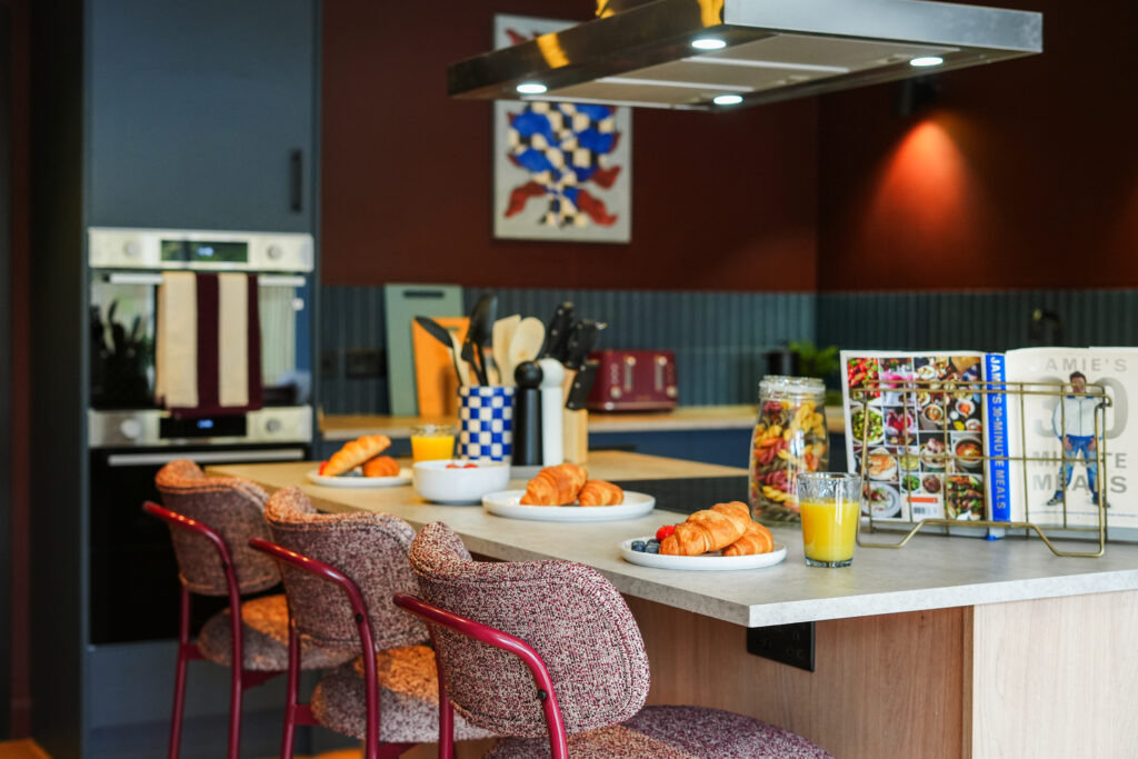 The large kitchen has an island to gather around